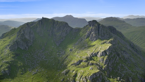 AX110_074.0000000F - Aerial stock photo of The Cobbler, a green mountain peak, Scottish Highlands, Scotland
