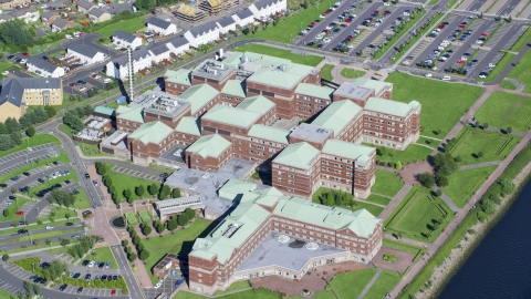 AX110_147.0000098F - Aerial stock photo of Golden Jubilee Hospital, Glasgow, Scotland