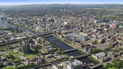 AX110_167.0000000F - Aerial stock photo of River Clyde with bridges by city buildings in Glasgow, Scotland