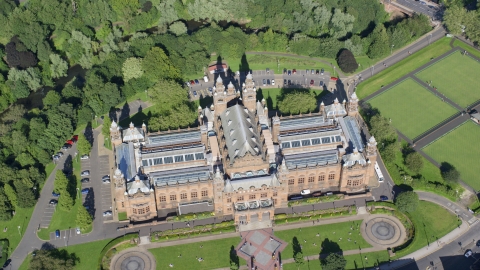 AX110_178.0000224F - Aerial stock photo of A bird's eye view of Kelvingrove Art Gallery and Museum, Glasgow, Scotland