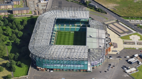 AX110_187.0000196F - Aerial stock photo of Celtic Park soccer stadium in Glasgow, Scotland