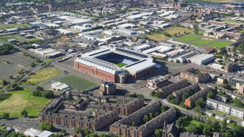 AX110_201.0000000F - Aerial stock photo of Ibrox Stadium soccer field in Glasgow, Scotland