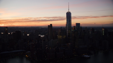 AX118_016.0000119F - Aerial stock photo of The World Trade Center at sunrise in Lower Manhattan, New York City
