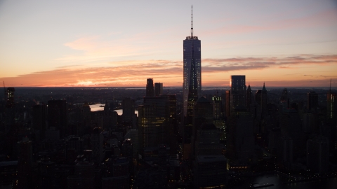 AX118_017.0000077F - Aerial stock photo of One World Trade Center at sunrise in Lower Manhattan, New York City