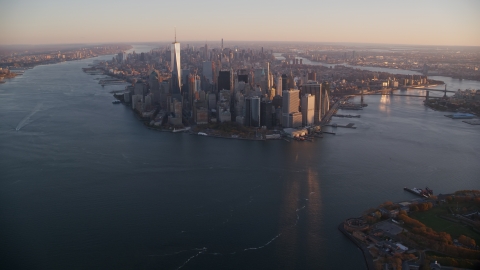 AX118_085.0000000F - Aerial stock photo of Lower Manhattan at sunrise, New York City