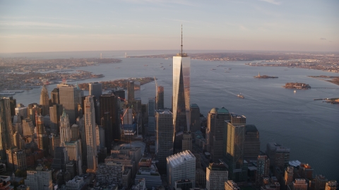 AX118_096.0000000F - Aerial stock photo of Freedom Tower at sunrise in Lower Manhattan, New York City