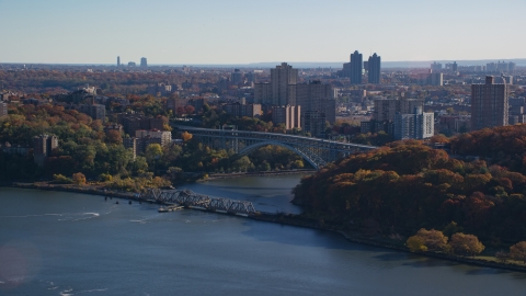 AX119_054.0000179F - Aerial stock photo of Henry Hudson and Spuyten Duyvil Bridges in Autumn, The Bronx, New York City