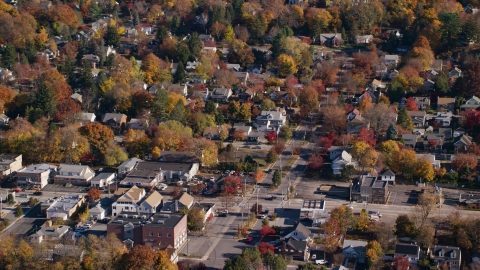 AX119_130.0000102F - Aerial stock photo of Small town homes around a street intersection in Autumn, Croton on Hudson, New York