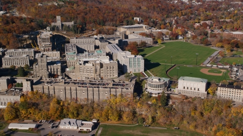 AX119_166.0000090F - Aerial stock photo of United States Military Academy in Autumn, West Point, New York