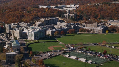 AX119_168.0000071F - Aerial stock photo of West Point Military Academy, The Plain, and baseball field in Autumn in New York