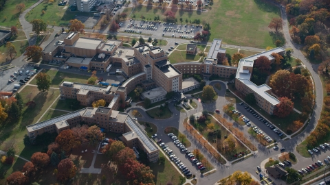 AX120_046.0000000F - Aerial stock photo of A hospital complex in Autumn, Jamaica, Queens, New York City