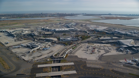 AX120_052.0000103F - Aerial stock photo of John F. Kennedy International Airport, New York City, in autumn