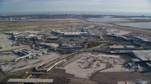 AX120_052.0000262F - Aerial stock photo of JFK International Airport in Autumn, New York City