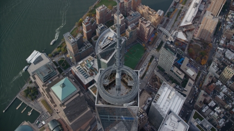 AX120_110.0000099F - Aerial stock photo of Bird's eye view of Freedom Tower spire in Lower Manhattan, New York City