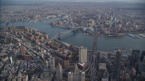 AX120_112.0000056F - Aerial stock photo of Brooklyn Bridge and Manhattan Bridge in New York City