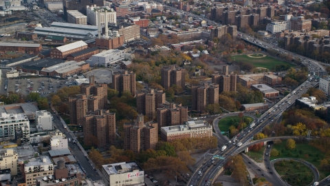 AX120_131.0000093F - Aerial stock photo of Public housing apartment buildings in Autumn, Brooklyn, New York City