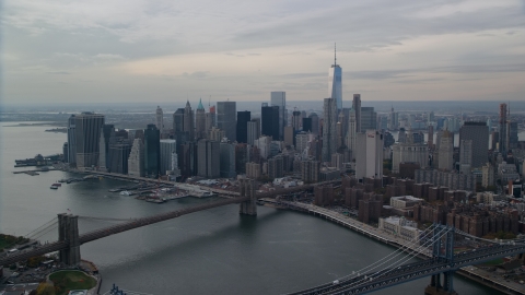 AX120_144.0000104F - Aerial stock photo of The Brooklyn Bridge and Lower Manhattan, New York City