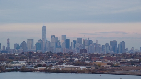 AX121_003.0000059F - Aerial stock photo of The Lower Manhattan skyline at sunset in Autumn, New York City