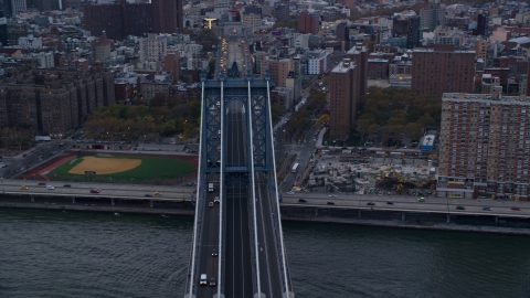 AX121_025.0000168F - Aerial stock photo of Manhattan Bridge at sunset in New York City