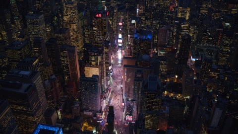 AX121_134.0000303F - Aerial stock photo of Times Square at night in Midtown Manhattan, New York City
