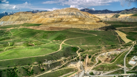 AX130_032_0000001 - Wide shot Bingham Canyon Mine, Copperton Utah Aerial Stock Photo