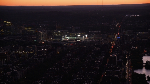 AX141_029.0000135 - Aerial stock photo of Fenway Park baseball stadium with bridge lights in Boston, Massachusetts, twilight