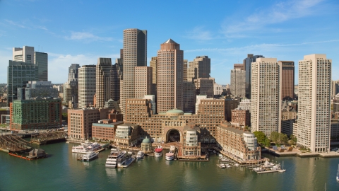 AX142_037.0000138 - Aerial stock photo of Rowes Wharf, One and Two International Place and skyscrapers in Downtown Boston, Massachusetts
