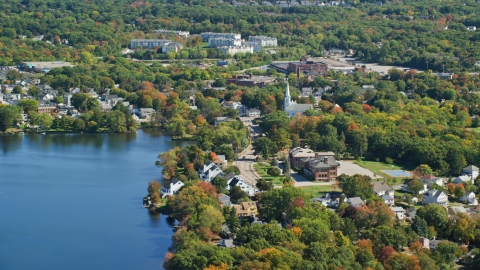 AX143_008.0000000 - Aerial stock photo of Small town with waterfront homes in autumn, Braintree, Massachusetts