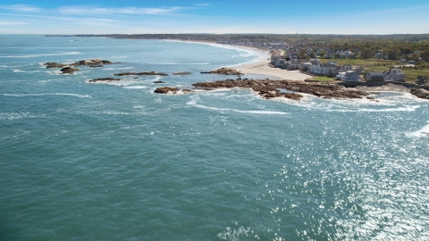 AX143_031.0000000 - Aerial stock photo of Beach and upscale oceanfront homes, Scituate, Massachusetts