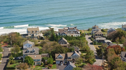 AX143_046.0000154 - Aerial stock photo of A group of upscale oceanfront homes, Scituate, Massachusetts
