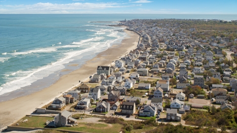 AX143_056.0000159 - Aerial stock photo of Oceanfront homes in a coastal town, Marshfield, Massachusetts