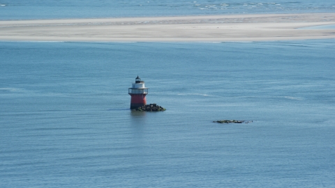AX143_084.0000000 - Aerial stock photo of Plymouth Light in Plymouth Harbor, Plymouth, Massachusetts