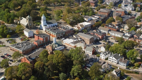 AX143_096.0000114 - Aerial stock photo of Churches and shops in the small town of Plymouth, Massachusetts