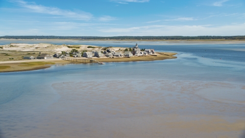 AX143_143.0000000 - Aerial stock photo of Sandy Neck Colony and Sandy Neck Light on Cape Cod, Barnstable, Massachusetts
