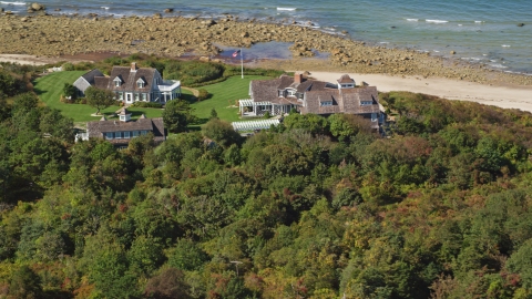 AX143_158.0000020 - Aerial stock photo of Upscale beachfront homes in Cape Cod, Dennis, Massachusetts