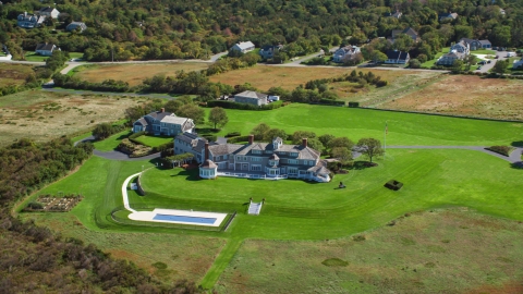 AX143_159.0000272 - Aerial stock photo of A beautiful mansion on Cape Cod, Dennis, Massachusetts