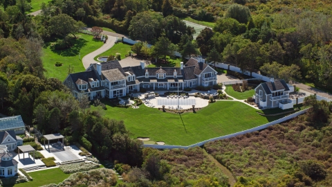 AX143_166.0000251 - Aerial stock photo of A mansion with lush, green lawns, Cape Cod, Dennis, Massachusetts