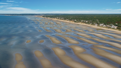AX143_182.0000000 - Aerial stock photo of Sand bars by a small coastal town, Eastham, Massachusetts