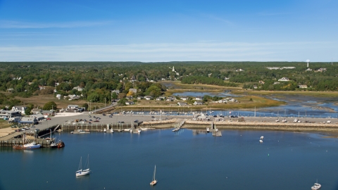 AX143_196.0000000 - Aerial stock photo of Wellfleet Town Pier and a small coastal community, Wellfleet, Massachusetts