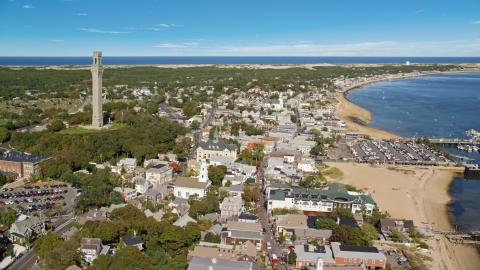 AX143_226.0000243 - Aerial stock photo of The iconic Pilgrim Monument in a small coastal town, Provincetown, Massachusetts