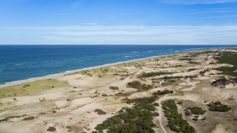 AX144_001.0000313 - Aerial stock photo of Sand dunes and beach on Cape Cod, Provincetown, Massachusetts