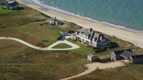 AX144_111.0000000 - Aerial stock photo of An upscale home by the beach in Nantucket, Massachusetts