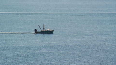AX144_167.0000000 - Aerial stock photo of A fishing boat on the Atlantic Ocean