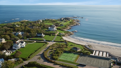 AX144_248.0000229 - Aerial stock photo of Oceanfront mansions in the coastal city of Newport, Rhode Island