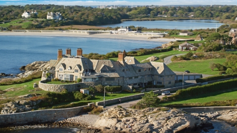 AX144_251.0000189 - Aerial stock photo of A beautiful oceanfront mansion in Newport, Rhode Island