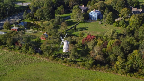 AX145_003.0000029 - Aerial stock photo of A small windmill in Portsmouth, Rhode Island