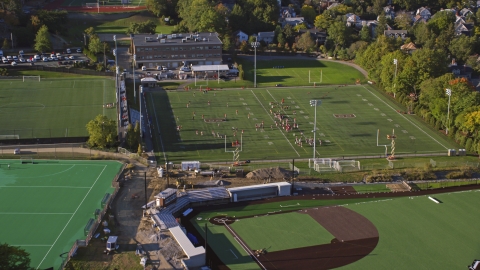AX145_064.0000179 - Aerial stock photo of Football practice on a field at Brown University, Providence, Rhode Island