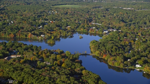 AX145_101.0000066 - Aerial stock photo of Lake Hiawatha in autumn, North Attleborough, Massachusetts