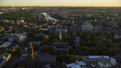 AX146_035.0000316F - Aerial stock photo of The Harvard University campus at sunset, Cambridge, Massachusetts