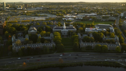 AX146_038.0000319F - Aerial stock photo of The Harvard Business School at Harvard University, Massachusetts, sunset